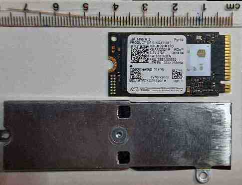 Ok to remove built-in Lenovo laptop battery?-original-m.2-heat-shield-ruler.jpg