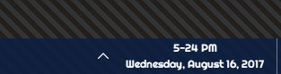 Strange symbol  between figures of clock on taskbar.-000070.png