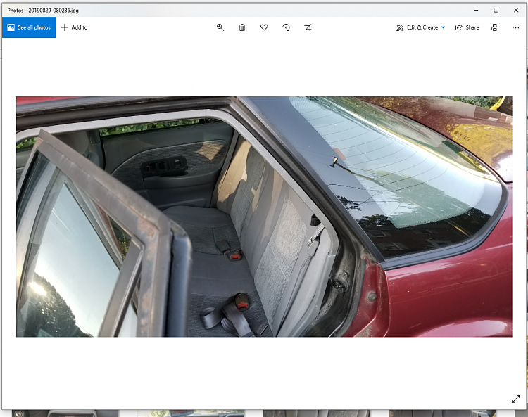 how to click next to view pictures in a folder?-car1.png